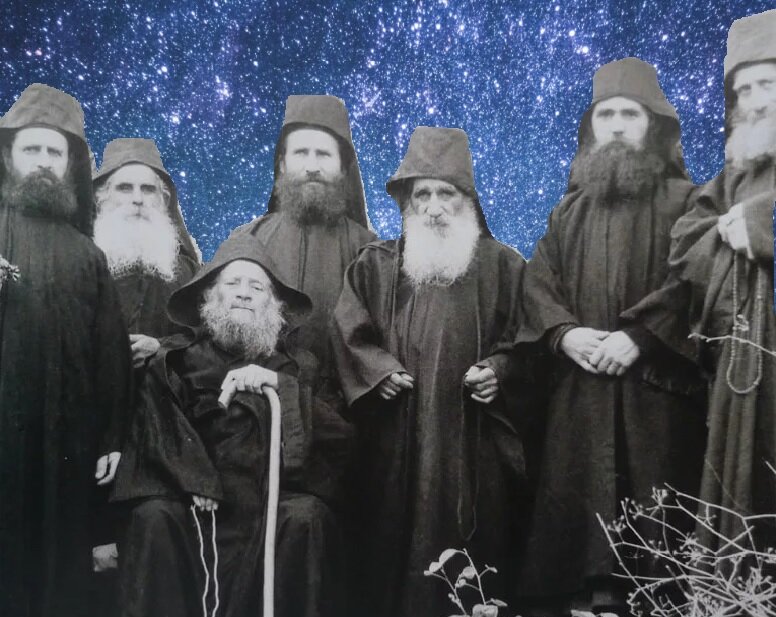 Старец Иосиф Исихаст (сидит) и его сподвижники