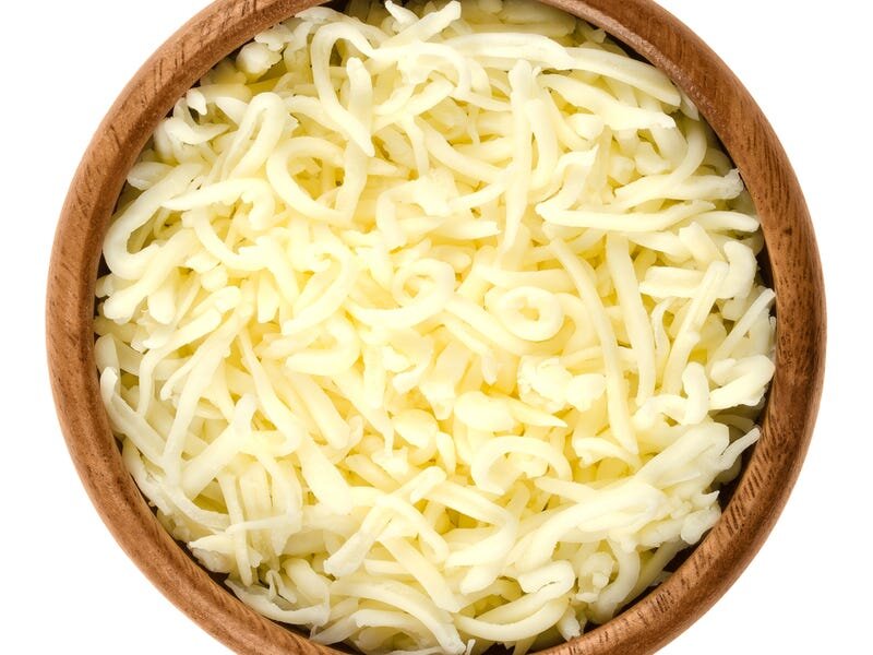 Тертый сыр. Peter Hermes Furian/Shutterstock