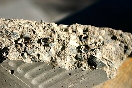 Впервые результаты по применению этого нового материала были получены в 1993 году учёным из Санкт-Петербурга Андреем Николаевичем Пономарёвым. Дальнейшие работы по исследованию свойств нанобетонов проводились учёными из Москвы, Новочеркасска и других городов.