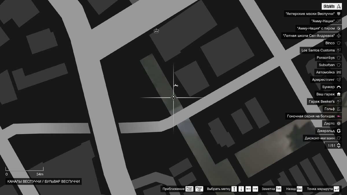 Фигурка Mini Pogo находится на деревянном спуске к водяному каналу в городе / Mini Pogo figurine is located on a wooden descent to the water channel in the city