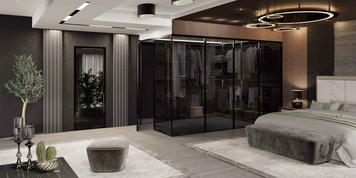 Перегородка Divisorio отделяет гардероб от спальной зоны, не утяжеляя пространство. Черное стекло перегородки и межкомнатной двери Invisible добавляет пространству "воздуха"  и визуально расширяет его.