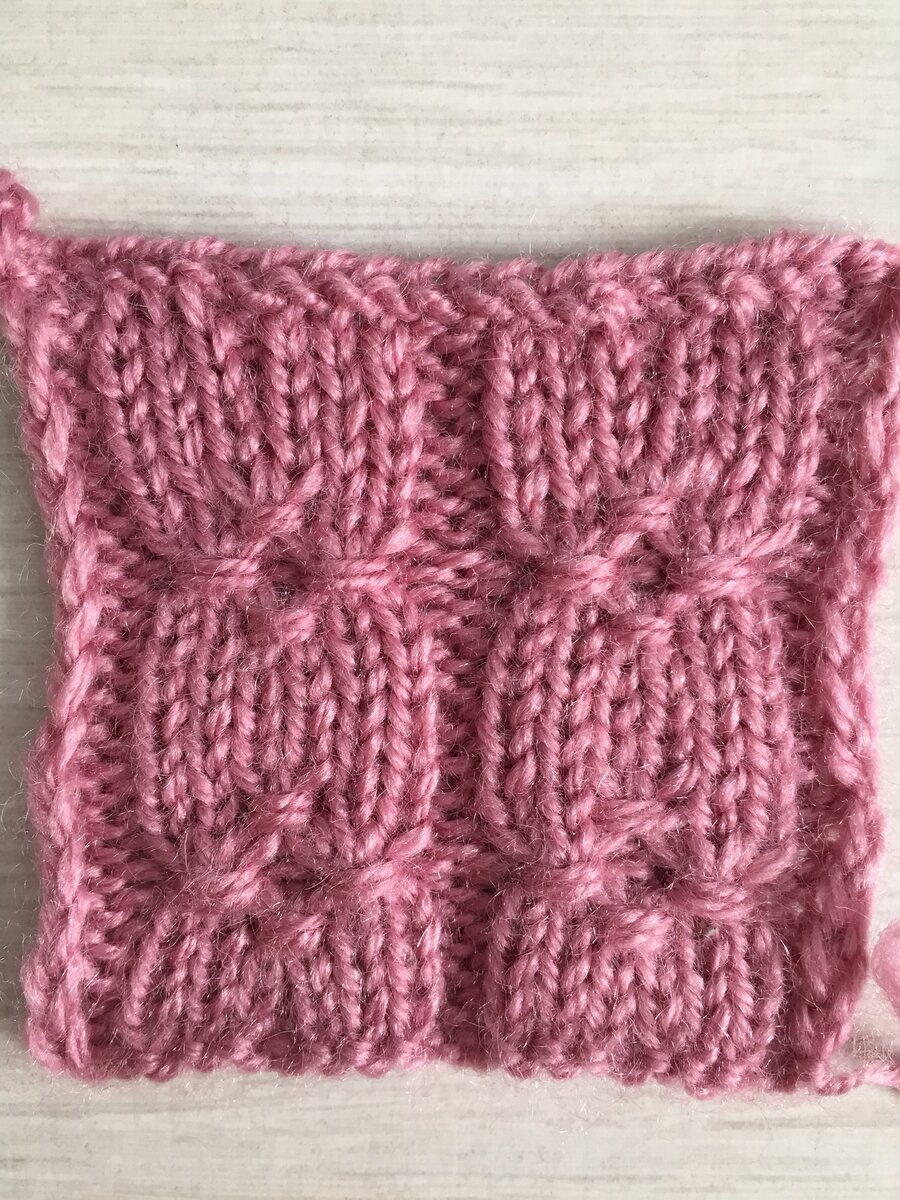 узор спицами из обвитых петель