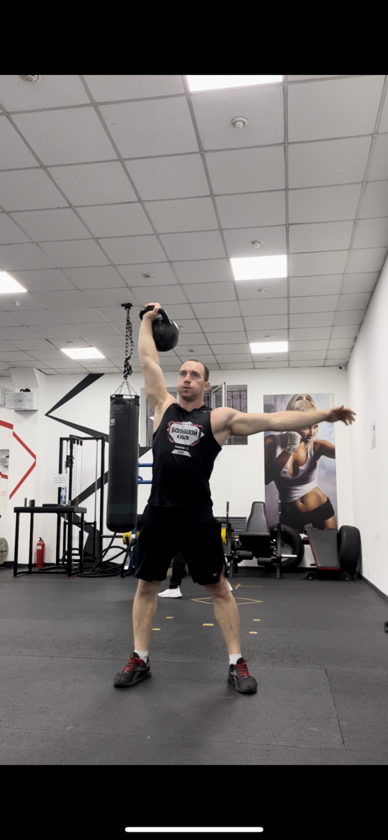 Толчок гири 24 кг по длинному циклу. 