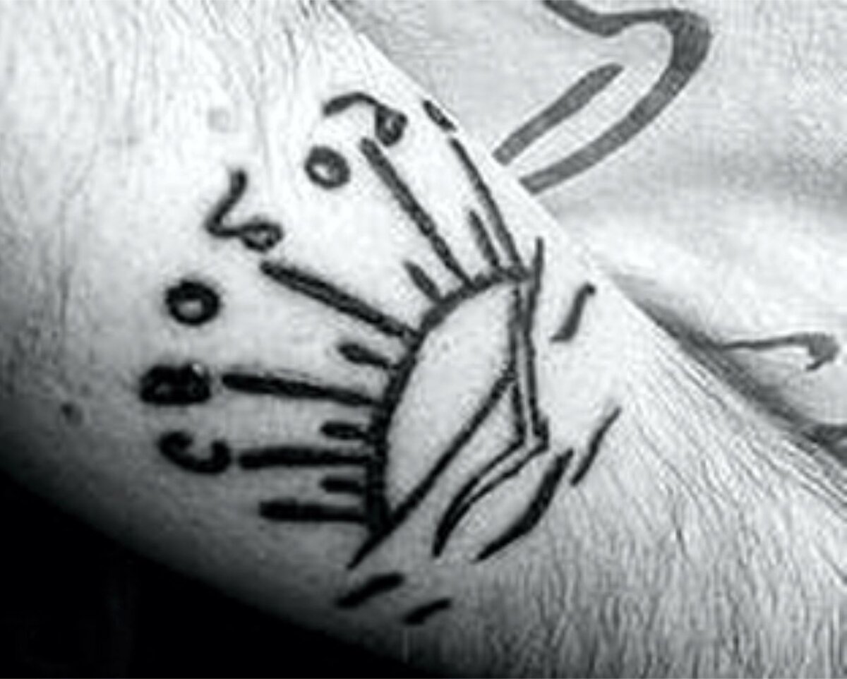 Закат на руке татуировка: мотивация и символика