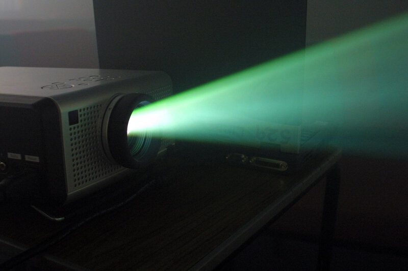 Из проектора лился свет так же, как из уст учёного доносилась скрытая от нас истина. 