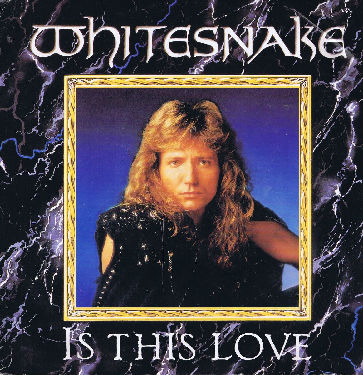 Обложка европейского сингла "Is This Love" британской рок-группы Whitesnake