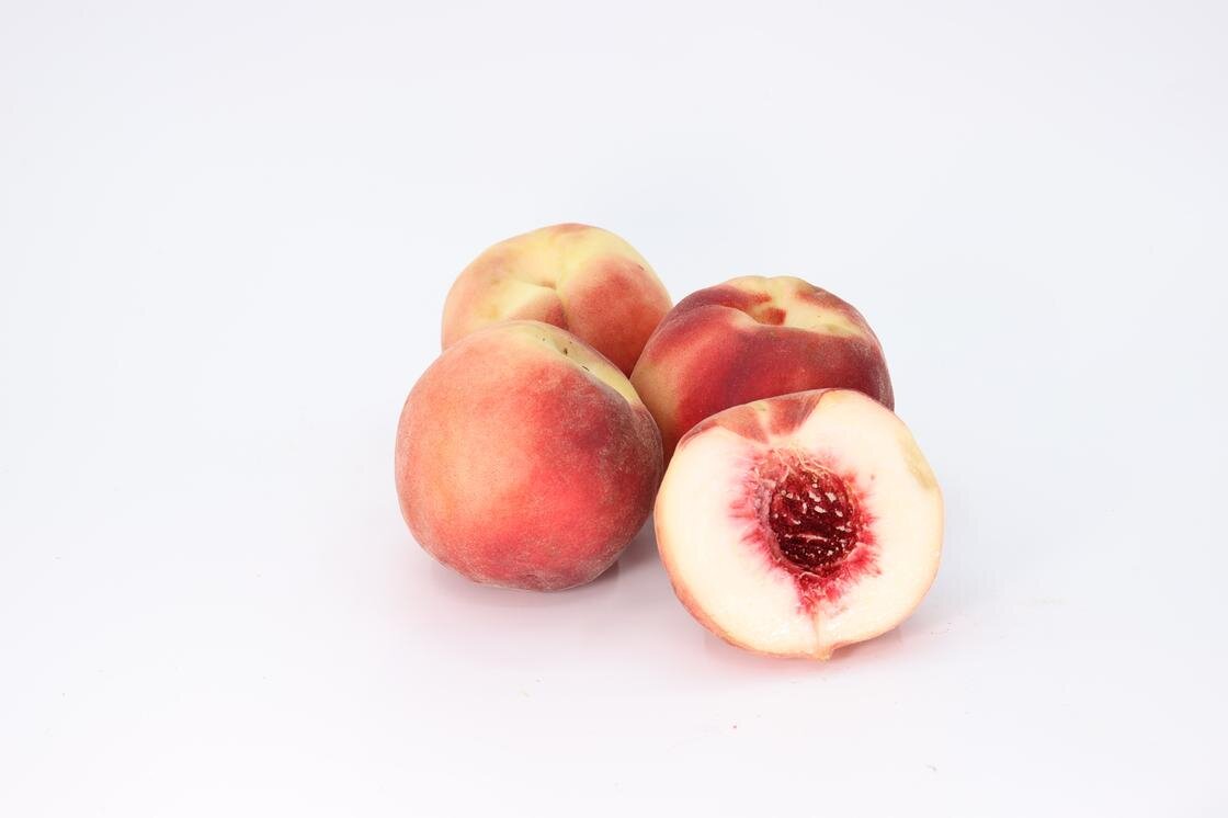    Четыре персика:Unsplash / Hamad Alahama