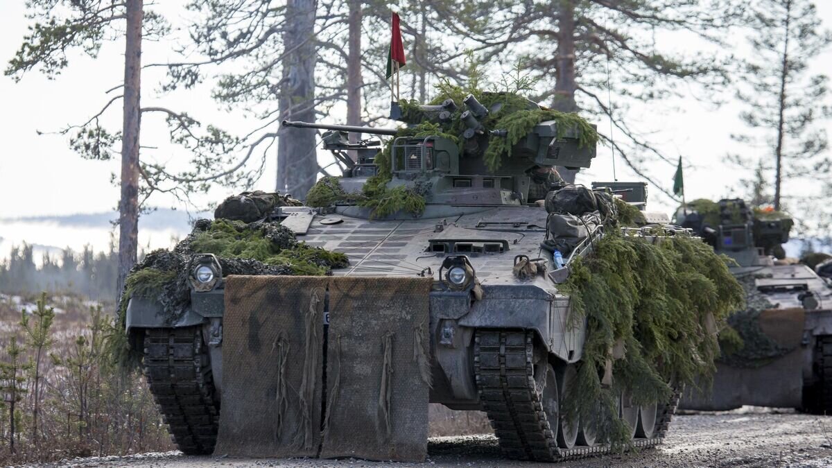    Немецкая боевая машина пехоты "Marder" во время учений© Фото : Marco Dorow