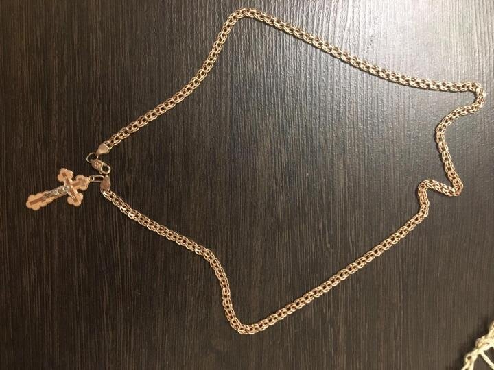 Пример золотой цепочки с крестиком 375 пробы. Фото из открытых источников.