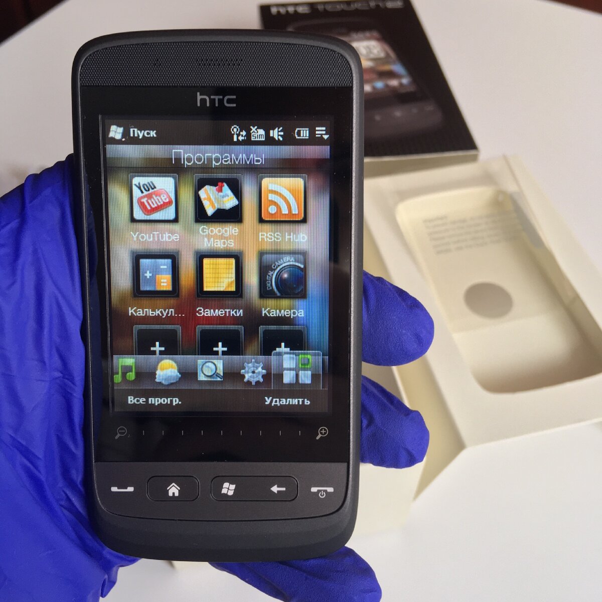 Распаковка нетронутого телефона htc touch2, спустя 12 лет!