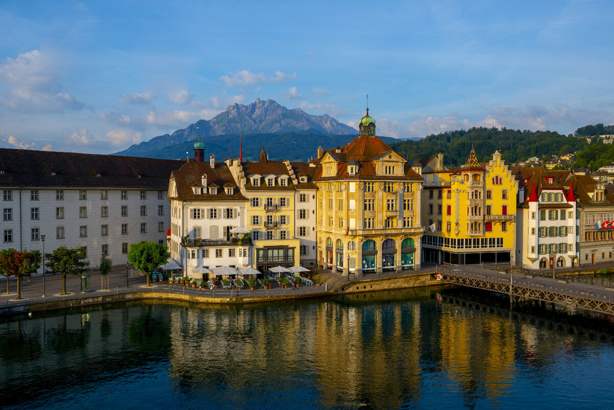 <a href="https://ru.freepik.com/free-photo/colorful-buildings-near-a-river-surrounded-by-mountains-in-lucerne-in-switzerland_10990435.htm#query=%D1%88%D0%B2%D0%B5%D1%86%D0%B8%D1%8F&position=15&from_view=search&track=sph">Изображение от wirestock</a> на Freepik