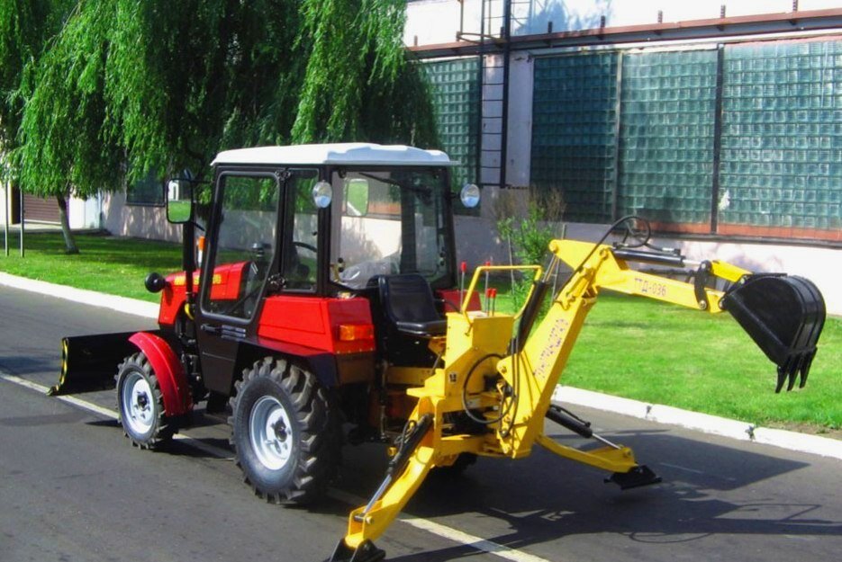 Трактор МТЗ Беларус-320 с экскаватором ТАиМ 