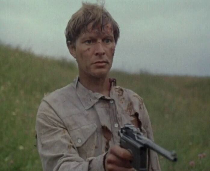 Кадр из фильма "В стреляющей глуши" (1986)