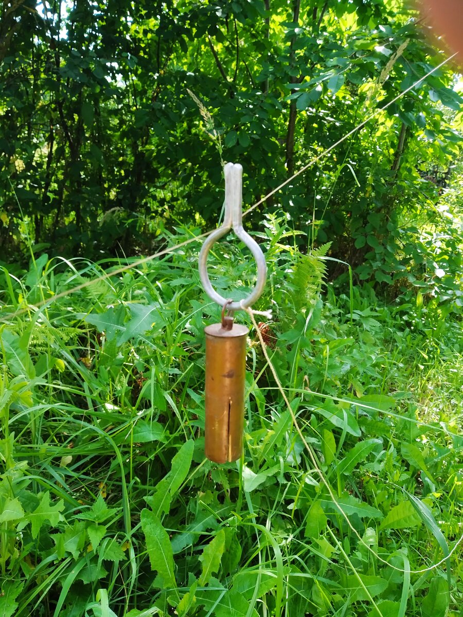 Колоколец с кольцевым зажимом лески. 