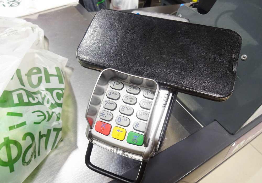 Телефон на кассовом терминале