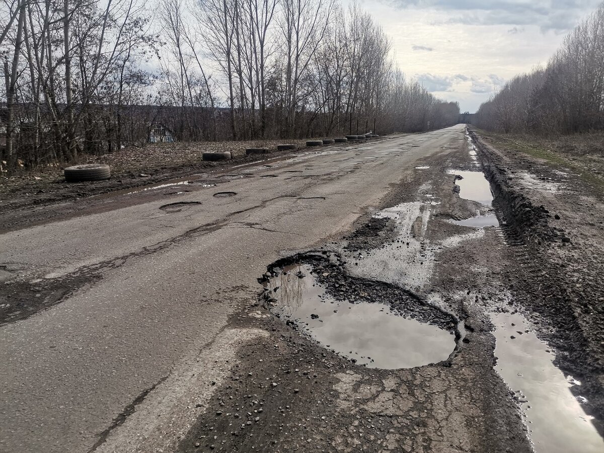 Российские дороги. Дороги в Украине. Ямы на дорогах. Украина дороги в ямах.