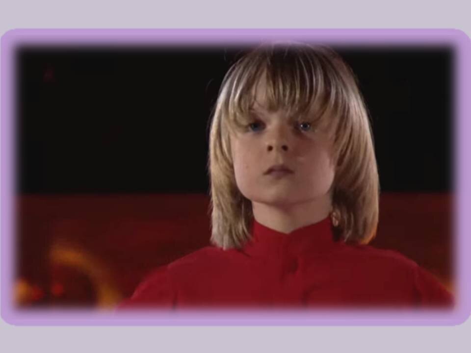 стоп-кадр видео с выступлением Я.Дронова и А.Плющенко