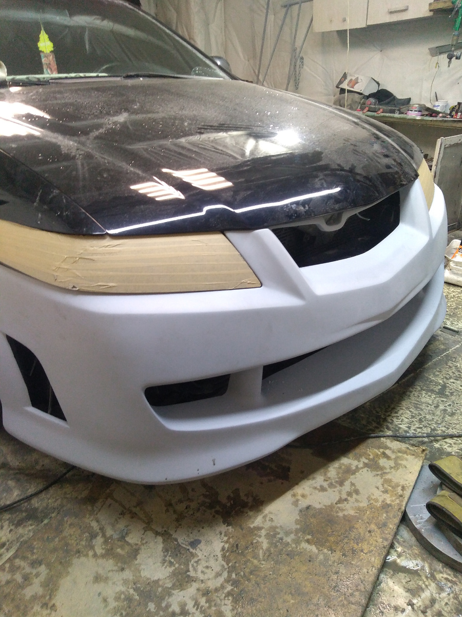 Выставить по зазорам оказалось и не так просто, , прекрутить его по местам, а потом разобрать и покрасить и еще пороги и задняя губа но об этом потом,