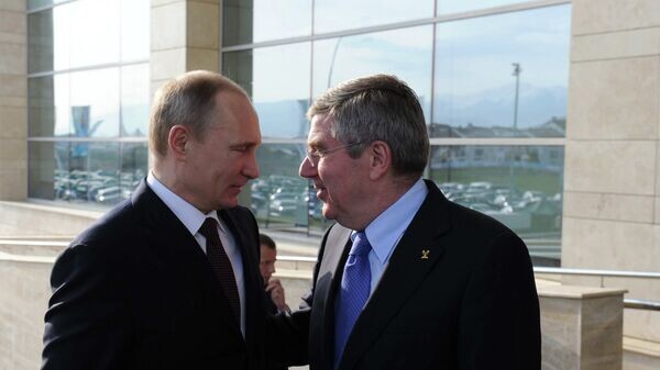    Президент России Владимир Путин (слева) и президент МОК Томас Бах© РИА Новости / Михаил Климентьев