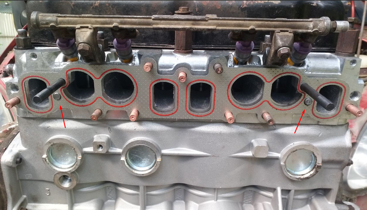 Шпильки под коллекторы и прокладка.