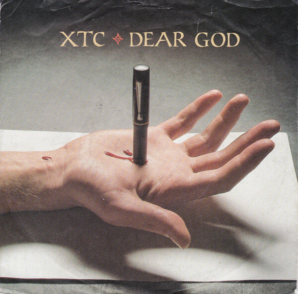 Обложка сингла XTC с песней Dear God (1986)