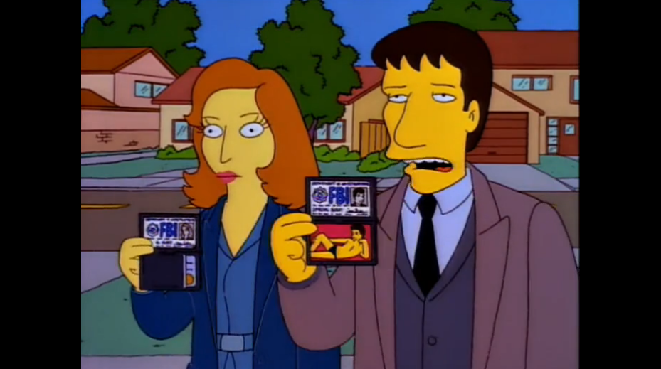 Агенты Скалли и Малдер (кроссовер с "Секретными материалами"). Внимание на фото, которое показывает Малдер //Симпсоны (The Simpsons), s08e10 © 20th Century Fox Film Corporation