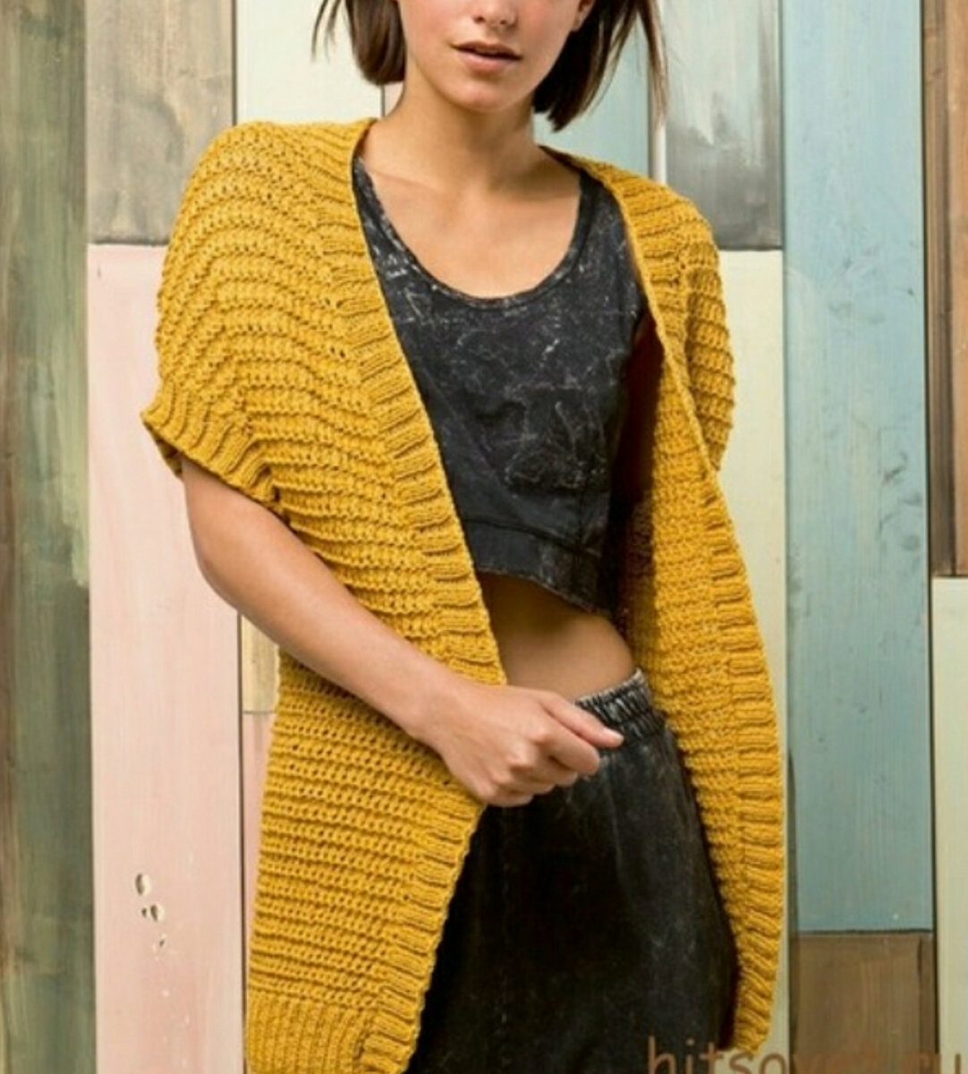 Жилет со спущенными рукавами.