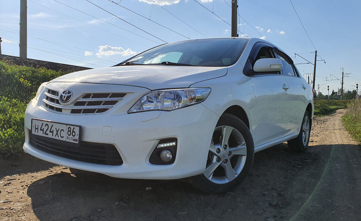 Toyota  Corolla e150 2012г рестайлинг 