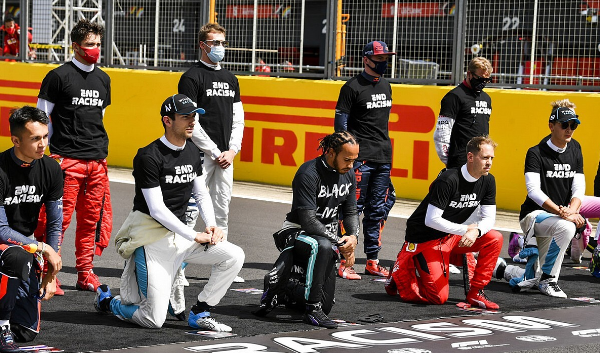 На заднем плане: Леклер, Квят, Ферстаппен, Райкконен