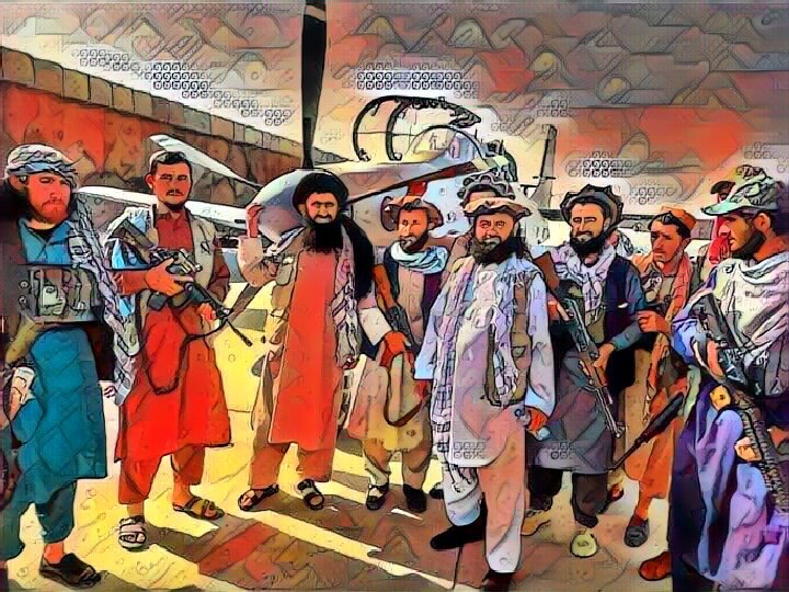 Исламисты позируют на фоне захваченного самолета A-29 Super Tucano ВВС Афганистана 