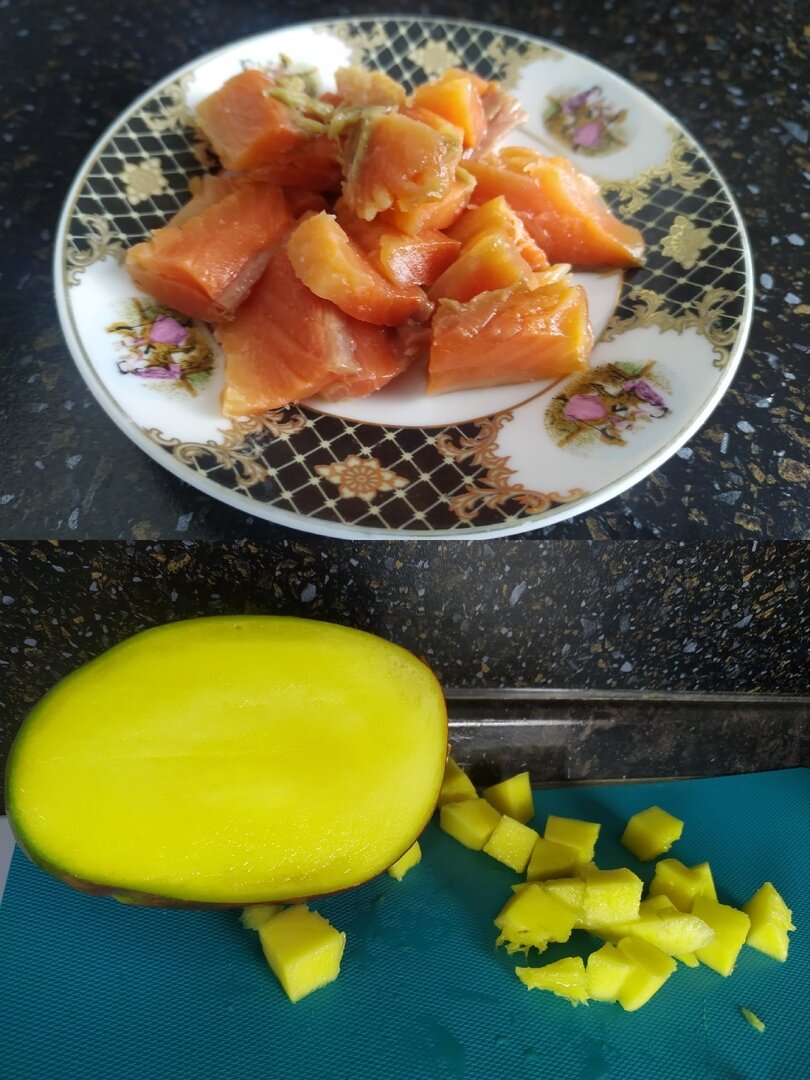 Рыбу нарезать на небольшие кусочки. Манго очистить от кожицы и нарезать кубиками. Отправить в тарелку к зелени.