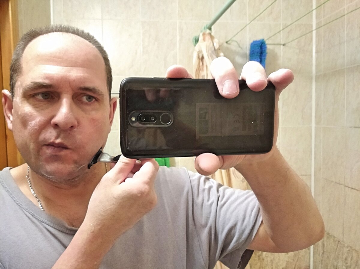 бритвой жилет