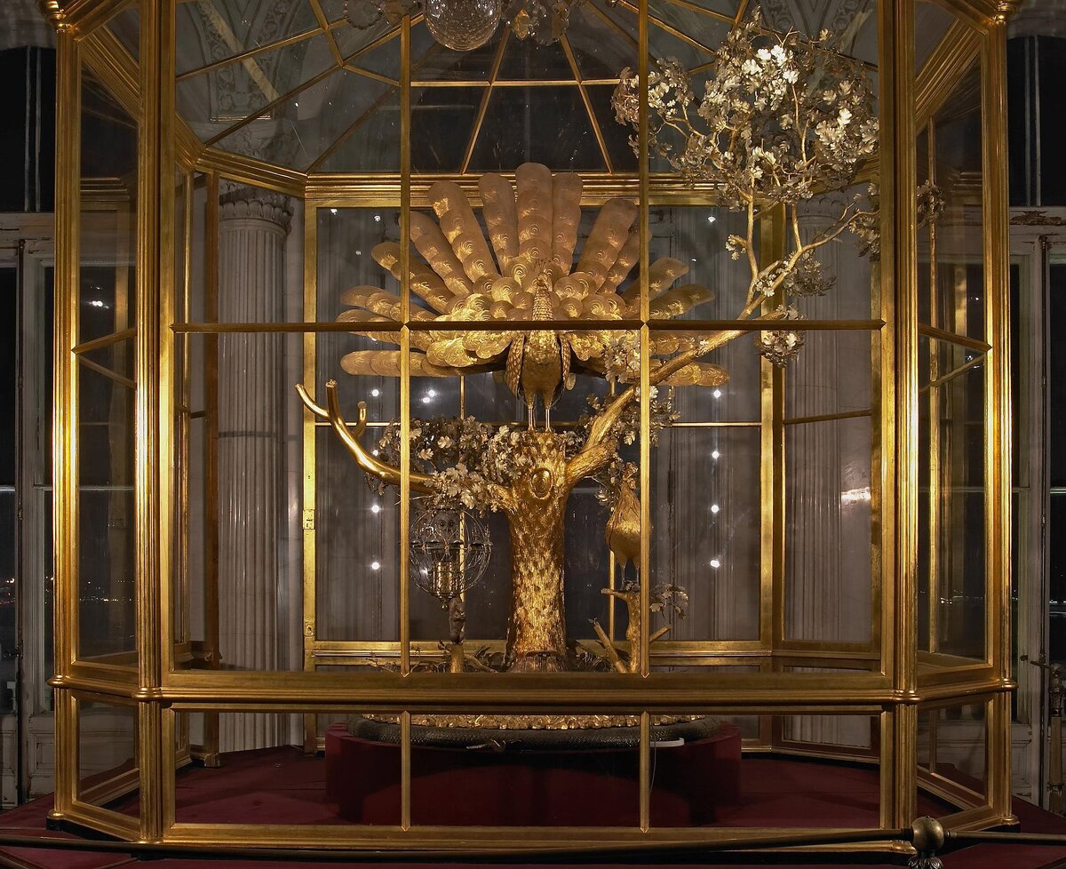 Часы Павлин, фото Яндекс.Картинки 