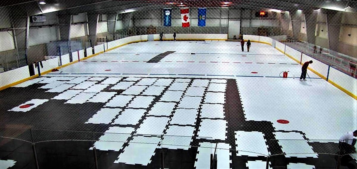 Full NHL size ice rink with Super-Glide synthetic ice