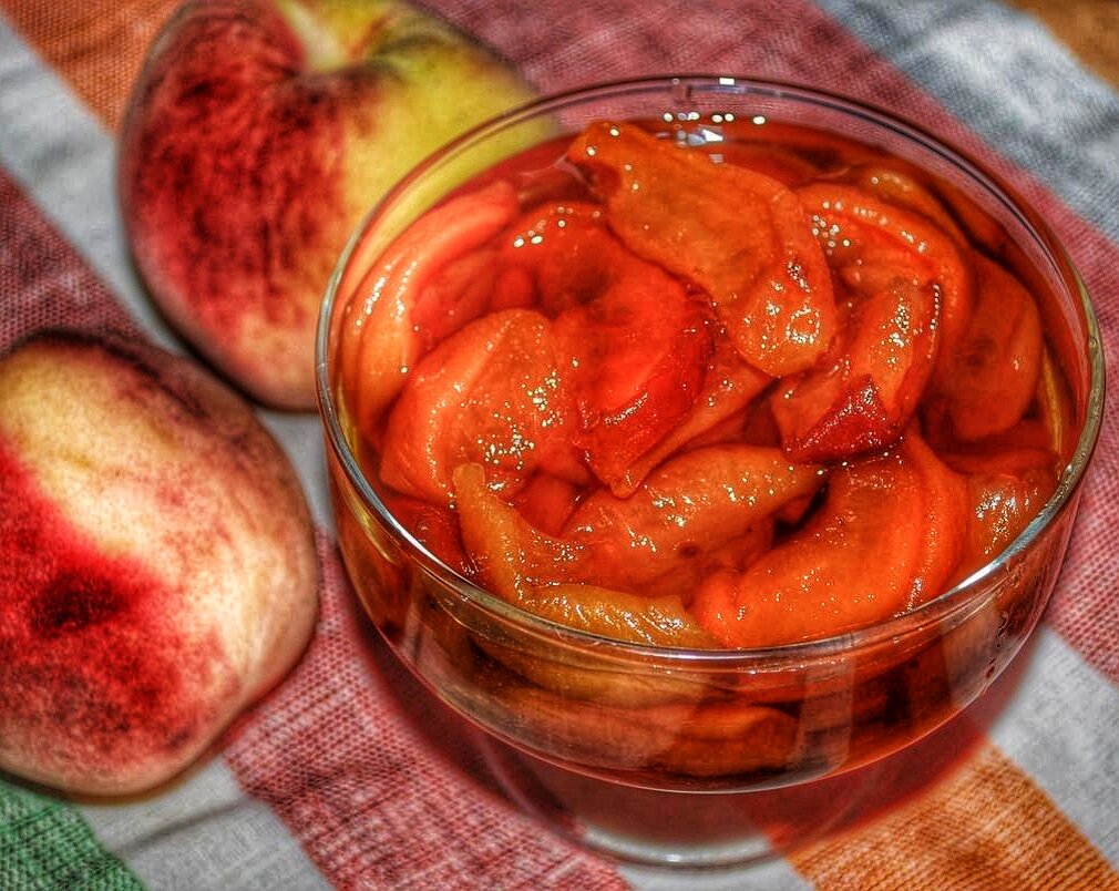 Джем с персиков на зиму рецепт. Варенье из персиков. Вкусный персик. Долька персика. Персики варенье картинки фото