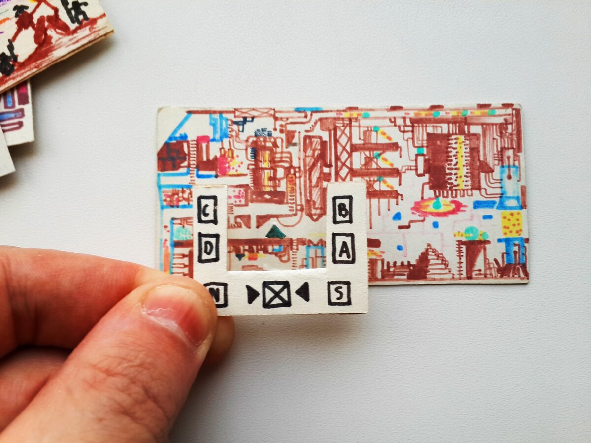 Один из вариантов игровой приставки. Треугольник по центру прозрачной пленки - главный герой