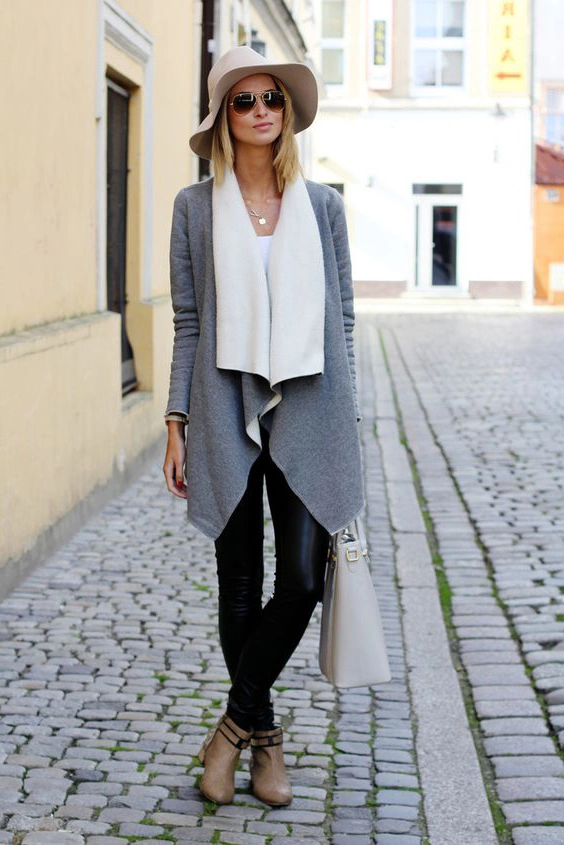 Девушка в сером кардигане с воротником-водопадом. /Фото: static.tildacdn.com