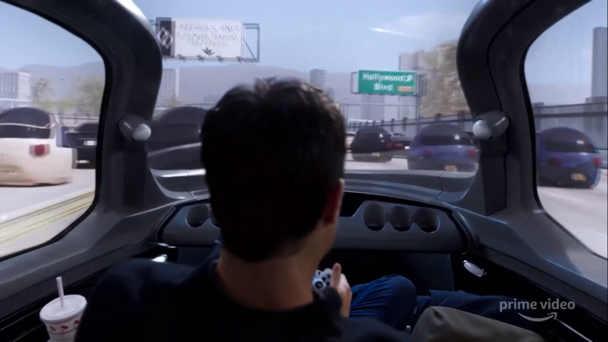 Кадр из сериала. Машины будущего, которыми можно управлять джойстиком. 