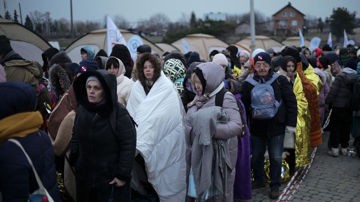    Беженцы на границе Украины и Польши в пункте пропуска Медыка© AP Photo / Markus Schreiber