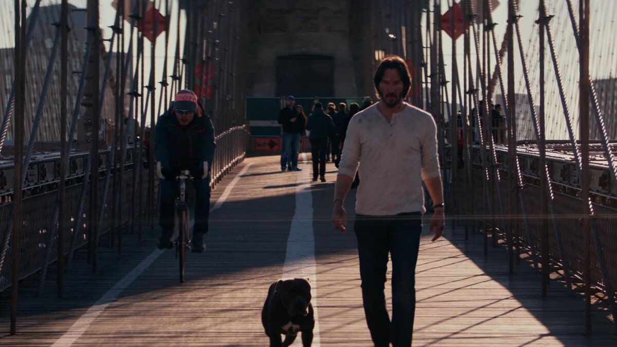 Джон с приятелем на Бруклинском мосту