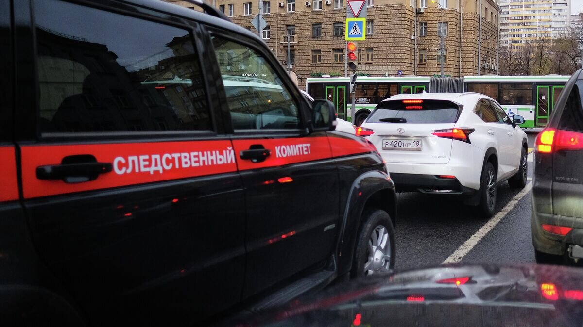    Автомобиль Следственного комитета на дороге© РИА Новости / Наталья Селиверстова