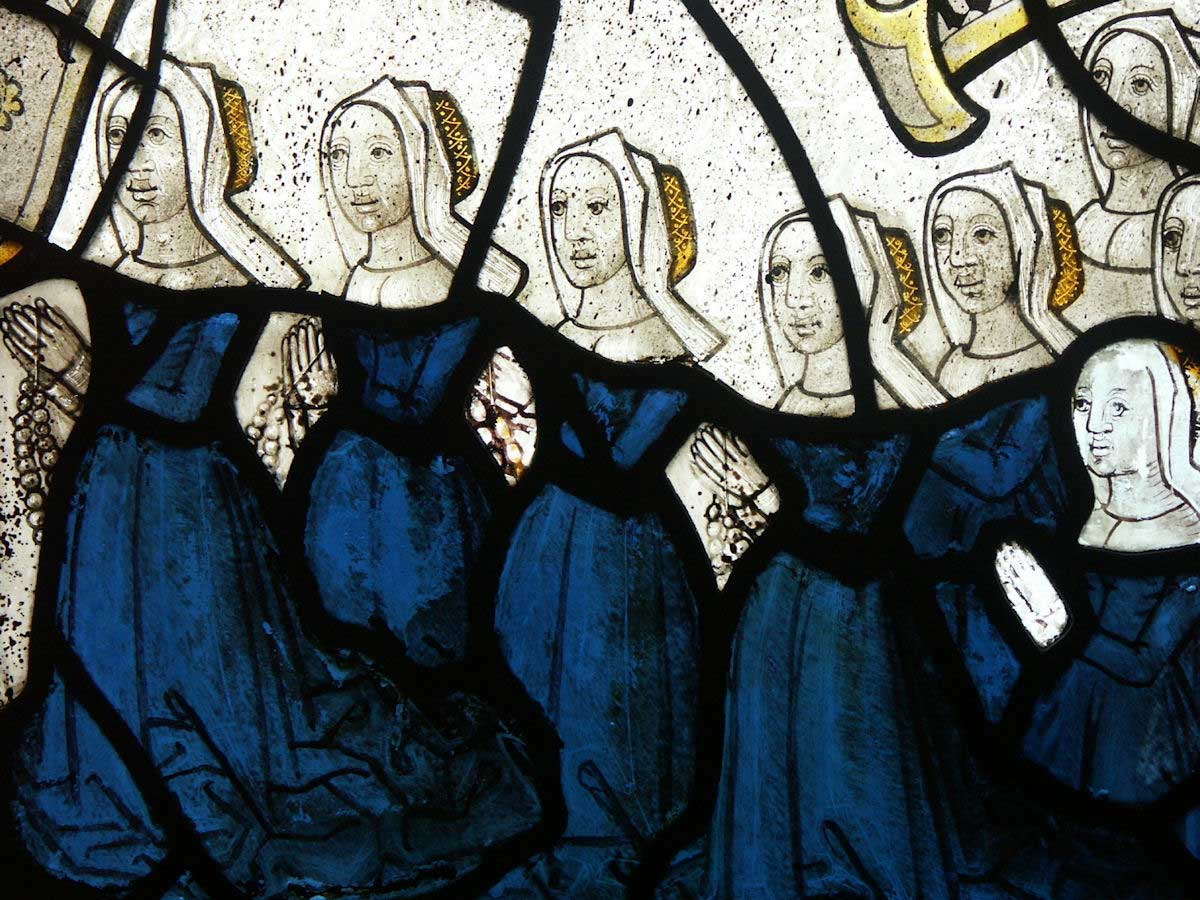 Деталь, показывающая молитвенную группу доноров в церкви Св. Неот, Корнуолл. В церкви сохранилось самое полное сохранившееся средневековое витражное стекло в стране. Wiki Commons / Маттана.