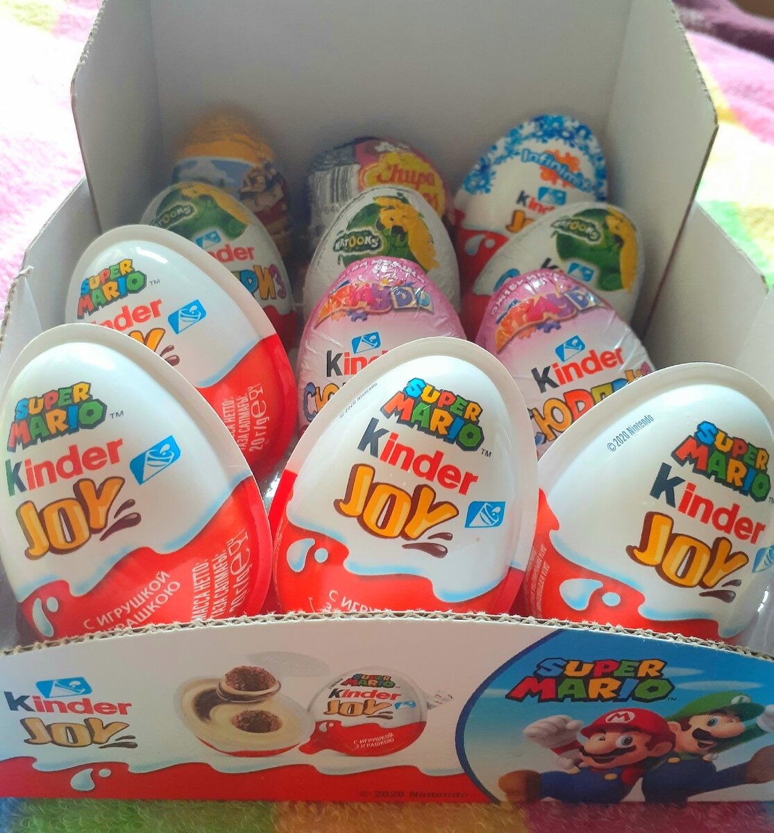 Киндеры в америке. Шоколадное яйцо kinder Joy super Mario. Распаковка киндеров. Киндер сюрприз и Киндер Джой. Киндер сюрприз Марио 2020.