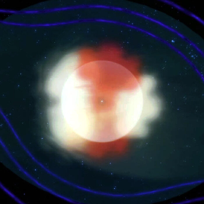 Вид спереди на хвост с солнцем в центре. Быстро движущиеся частицы показаны красным цветом, медленные – белым. Фото: NASA/Goddard Space Flight Center