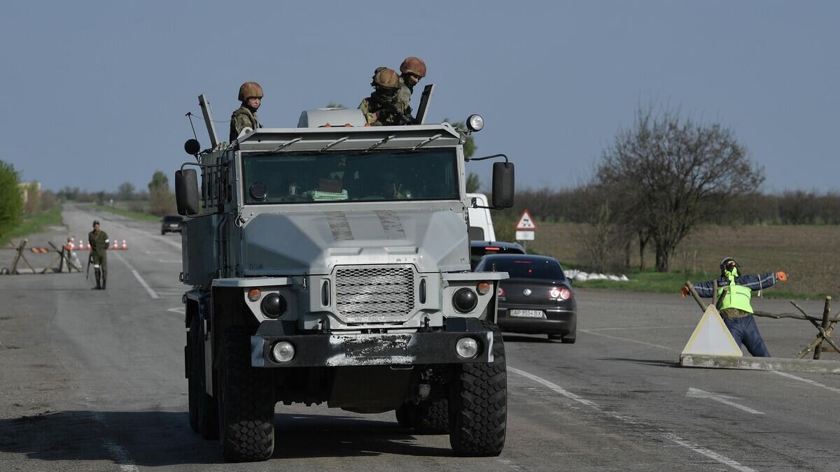    Военнослужащий ВС РФ в Энергодаре© РИА Новости / РИА Новости