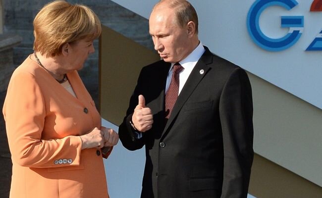 Ангела Меркель и Владимир Путин. Иллюстрация: voicesevas.ru