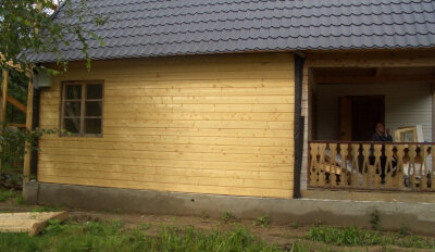 Имитация бруса, покрытая антисептиком 