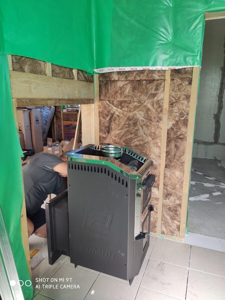 Монтаж выноса печи, декоративной рамки и установка печи на заранее подготовленное место.