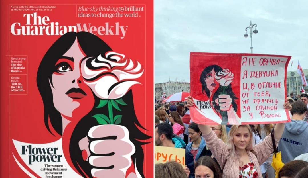 Протестующий в Минске несет плакат на обложке Guardian Weekly.