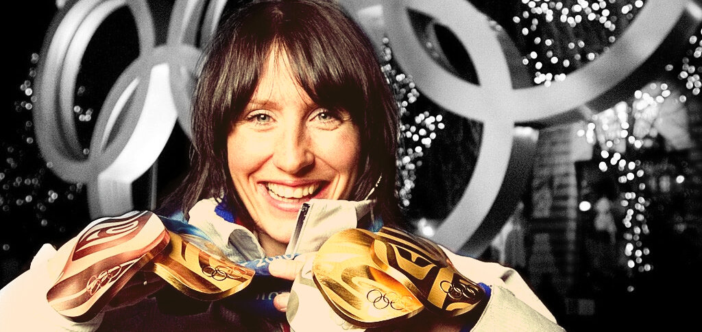 Марит Бьёрген и крохотная часть ее медалей. Фото из открытых источников